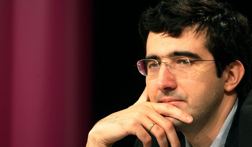 FILE - Russia's Vladimir Kramnik meets the media during a news conference after the 10th game of the Chess World Championship in the Art and Exhibition Hall of the Federal Republic of Germany in Bonn, western Germany, Oct. 27, 2008. (AP Photo/Hermann J. Knippertz, File)