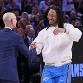 Oklahoma City Thunder forward Jaylin Williams, right, greets NBA commissioner Adam Silver during the championship ring ceremony before an NBA basketball game against the Houston Rockets, Tuesday, Oct. 21, 2025, in Oklahoma City. (AP Photo/Nate Billings)
