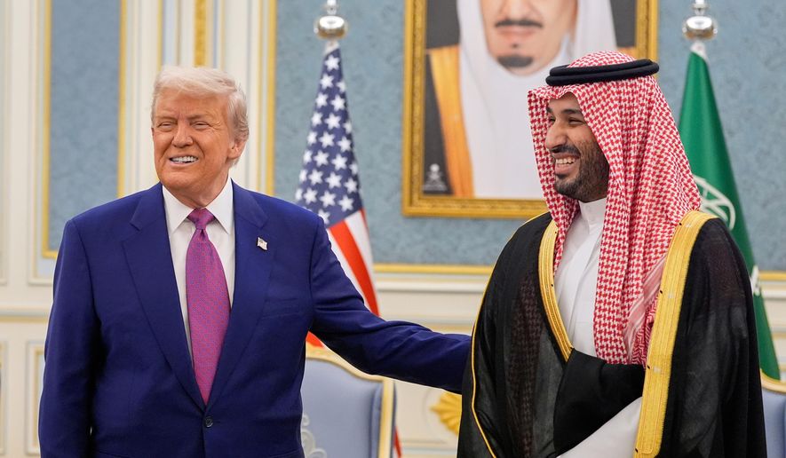 FILE - President Donald Trump and Saudi Crown Prince Mohammed bin Salman meet at the Royal Palace in Riyadh, Saudi Arabia, May 13, 2025. (AP Photo/Alex Brandon, File)