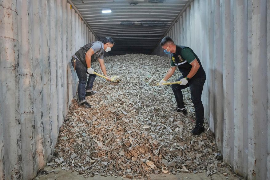 FILE - Thai officials show samples of illegally imported electronic waste from the United States which they said they seized at Bangkok Port during a press conference in Bangkok, Thailand, May 14, 2025. (AP Photo/Sakchai Lalit), File)