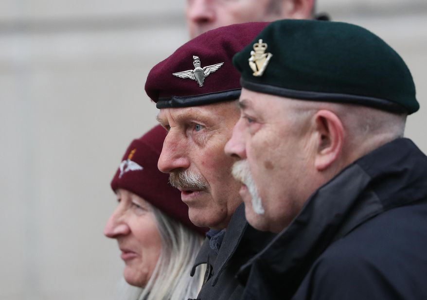 Supporters of Soldier F outside Belfast Crown Court following the not guilty verdict of soldier F in the1972 Bloody Sunday Massacre, Belfast, Northern Ireland, Thursday, Oct. 23, 2025. (AP Photo/Peter Morrison)