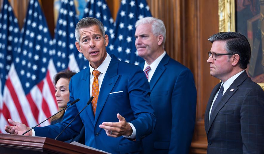 Transportation Secretary Sean Duffy speaks to reporters on day 23 of the government shutdown as he is joined by, from left, Rep. Lisa McClain, R-Mich., House Majority Whip Tom Emmer, R-Minn., and Speaker of the House Mike Johnson, R-La., at a news conference at the Capitol in Washington, Thursday, Oct. 23, 2025. (AP Photo/J. Scott Applewhite)