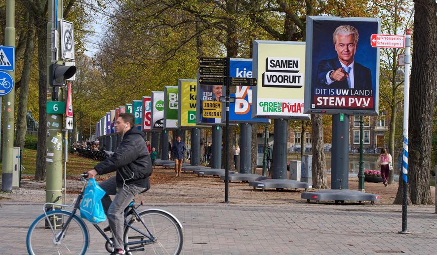Election billboards of 26 of the 27 political parties participating in the Oct. 29 general elections are lined up in The Hague, Netherlands, Wednesday, Oct. 22, 2025. (AP Photo/Peter Dejong)