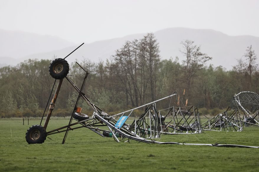 Farm irrigation equipment lays on the ground after it is damaged by strong winds in Waiau, New Zealand, Thursday, Oct. 23, 2025. (Chris Skelton/STUFF via AP)
