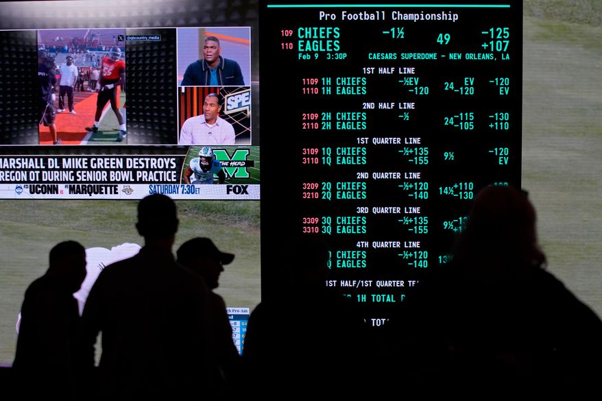 Betting odds for Super Bowl LIX are displayed on monitors at the Circa resort and casino sports book in in Las Vegas on Jan. 30, 2025. (AP Photo/John Locher) **FILE**