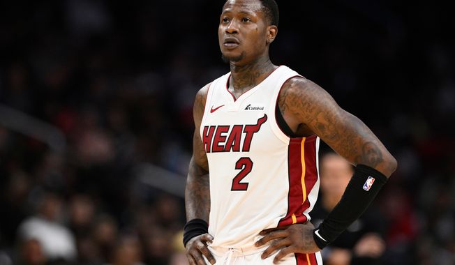 FILE - Miami Heat guard Terry Rozier (2) looks on during the second half of an NBA basketball game against the Washington Wizards, Sunday, March 31, 2024, in Washington. (AP Photo/Nick Wass, File)
