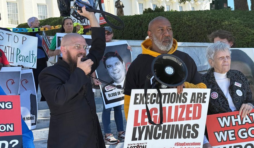 The Rev. Jeff Hood speaks at a protest against the death penalty on Wednesday, Oct. 22, 2025, at the Alabama Capitol in Montgomery, Ala. (AP Photo/Kim Chandler)