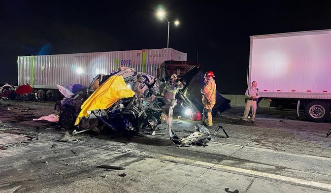 In this photo provided by the San Bernardino County District Attorney’s Office High Tech Crimes Unit, shows officials processing the scene of a deadly multi-vehicle crash Tuesday, Oct. 21, 2025, in Ontario, Calif. (San Bernardino County District Attorney’s Office High Tech Crimes Unit via AP)