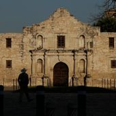 A ranger patrols the ground of the Alamo in San Antonio, Thursday, March 26, 2020. (AP Photo/Eric Gay, File)