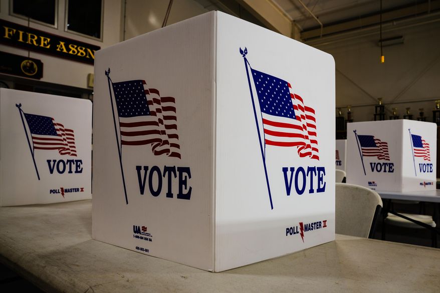 FILE - Voting booths are set up at a polling place in Newtown, Pa., Tuesday, April 23, 2024. (AP Photo/Matt Rourke, File)