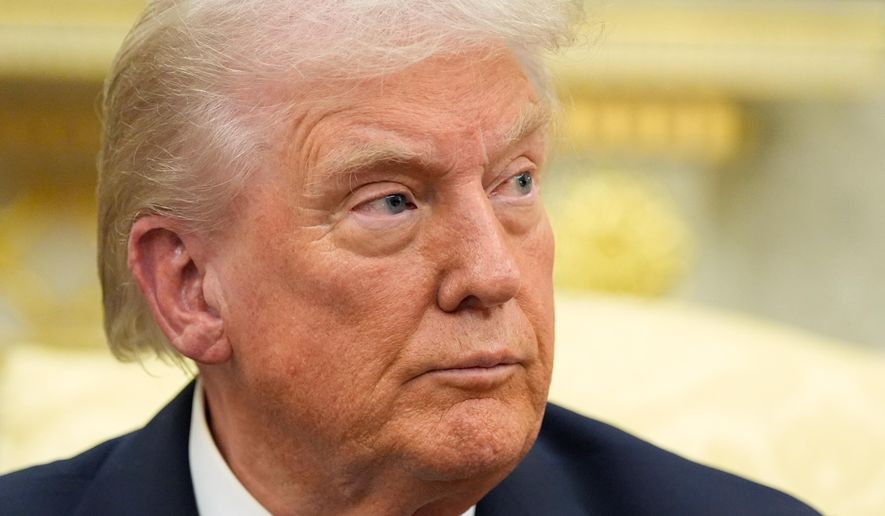 President Donald Trump listens to a question from a reporter as he meets with NATO Secretary General Mark Rutte in the Oval Office of the White House, Wednesday, Oct. 22, 2025, in Washington. (AP Photo/Alex Brandon)