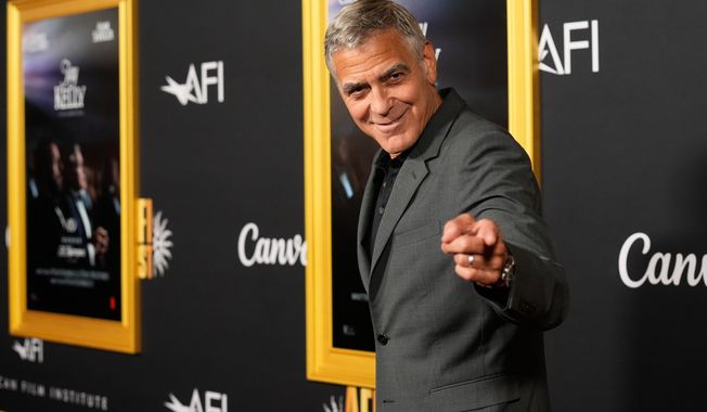 George Clooney, a cast member in "Jay Kelly," arrives at the AFI Fest premiere of the film on Thursday, Oct. 23, 2025, at TCL Chinese Theatre in Los Angeles. (AP Photo/Chris Pizzello)