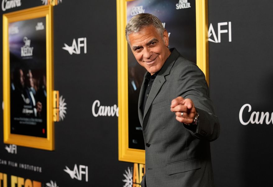 George Clooney, a cast member in "Jay Kelly," arrives at the AFI Fest premiere of the film on Thursday, Oct. 23, 2025, at TCL Chinese Theatre in Los Angeles. (AP Photo/Chris Pizzello)