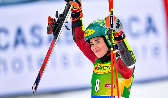 Austria's Julia Scheib celebrates winning an alpine ski, women’s World Cup giant slalom, in Soelden, Austria, Saturday, Oct. 25, 2025. Gian Ehrenzeller/Keystone via AP)