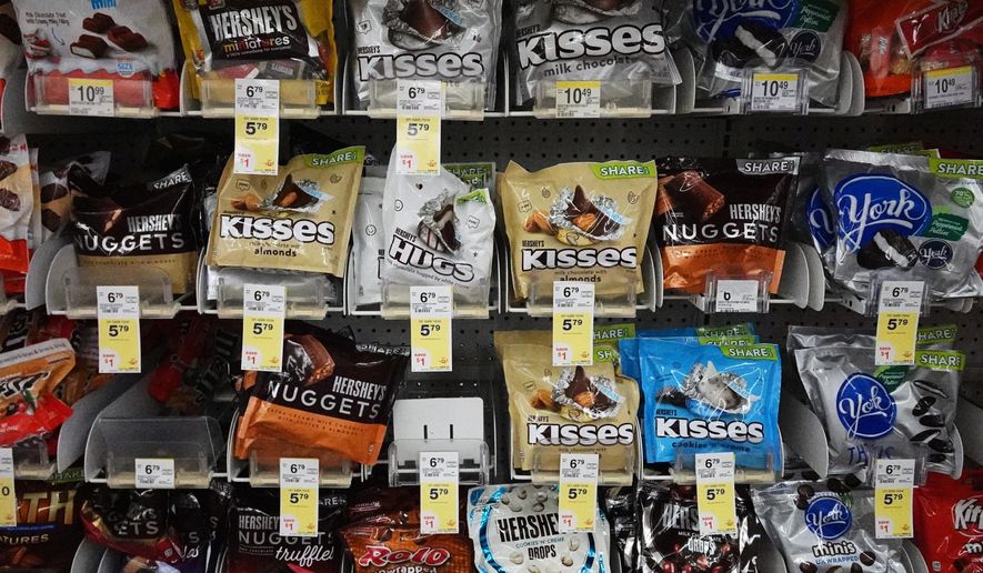 Hershey's chocolate are displayed on shelves at a grocery store in Mount Prospect, Ill., Monday, Oct. 20, 2025. (AP Photo/Nam Y. Huh)