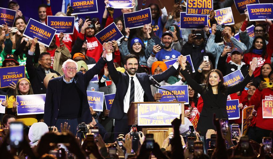 Sen. Bernie Sanders, I-Vt., left, then-New York City mayoral candidate Zohran Mamdani, center, and Rep. Alexandria Ocasio-Cortez, D-N.Y., appear on stage during a rally, Sunday, Oct. 26, 2025, in New York. (AP Photo/Heather Khalifa) ** FILE **