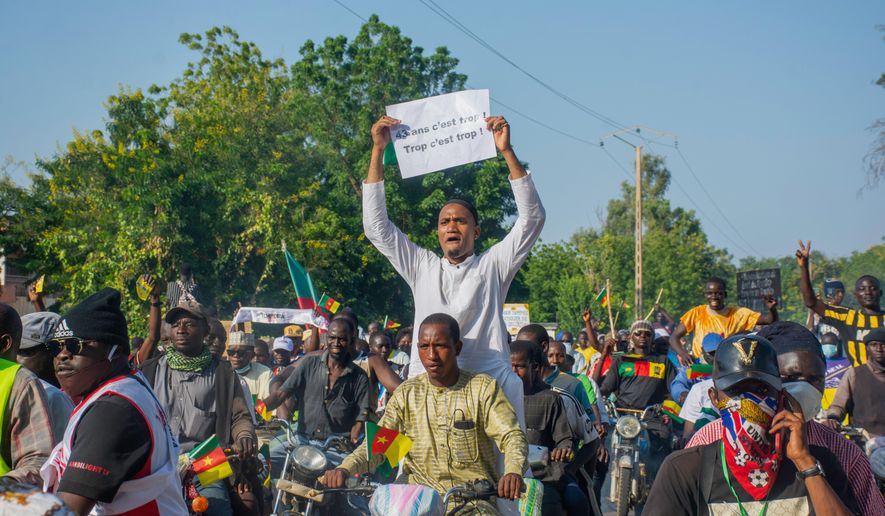 Supporters of opposition presidential candidate Issa Tchiroma, protest on the streets of Garoua, Cameroon, Sunday, Oct. 26, 2025. (AP Photo/Welba Yamo Pascal)