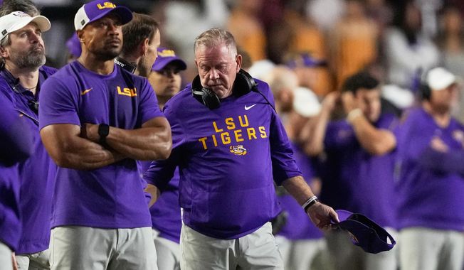 LSU head coach Brian Kelly talks on the sideline in the second half of an NCAA college football game against Texas A&M, Saturday, Oct. 25, 2025 in Baton Rouge, La. (AP Photo/Gerald Herbert)