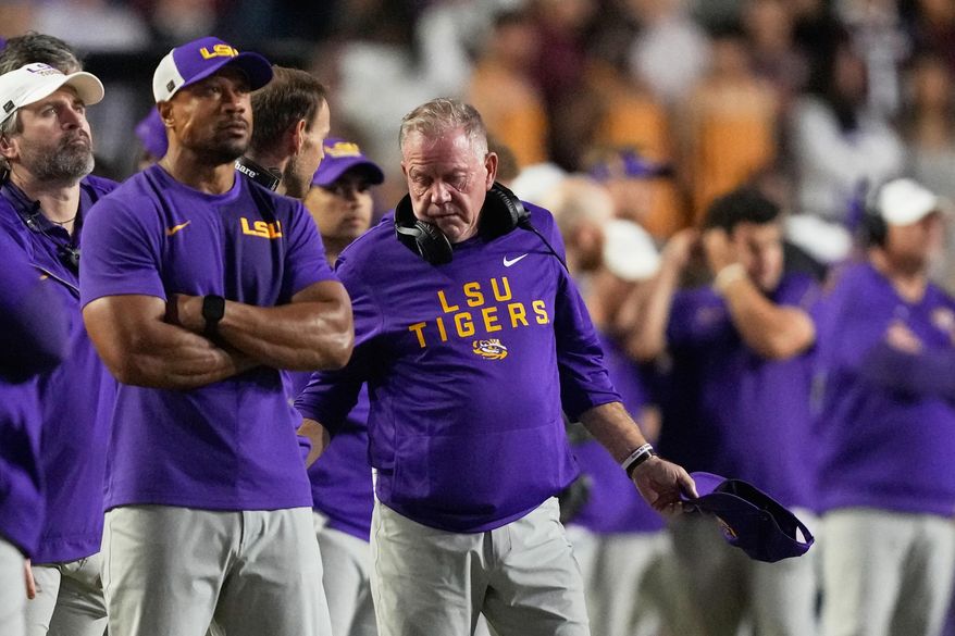 LSU head coach Brian Kelly talks on the sideline in the second half of an NCAA college football game against Texas A&M, Saturday, Oct. 25, 2025 in Baton Rouge, La. (AP Photo/Gerald Herbert)
