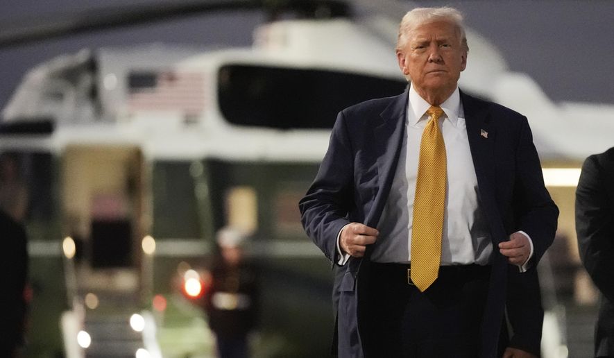President Donald Trump arrives at Haneda Airport before switching his ride to Marine One in Tokyo, Japan, Monday, Oct. 27, 2025, following his visit at the ASEAN summit in Malaysia. (AP Photo/Mark Schiefelbein)