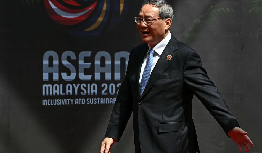 China's Premier Li Qiang arrives at the Kuala Lumpur Convention Centre to attend the 47th Association of Southeast Asian Nations (ASEAN) summit in Kuala Lumpur, Malaysia, Monday, Oct. 27, 2025. (Lillian Suwanrumpha/Pool Photo via AP)