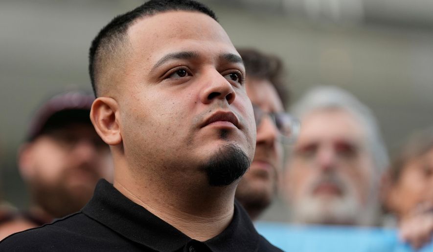FILE - Kilmar Abrego Garcia attends a protest rally at the Immigration and Customs Enforcement field office in Baltimore, Aug. 25, 2025, to support Abrego Garcia. (AP Photo/Stephanie Scarbrough, File)