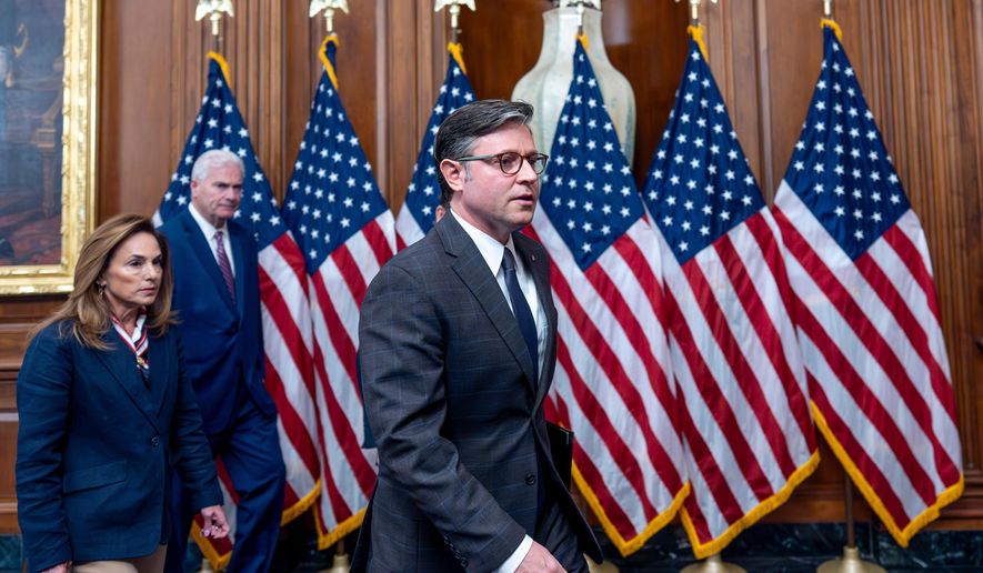 Speaker of the House Mike Johnson, R-La., center, joined from left by Rep. Lisa McClain, R-Mich., chair of the House Republican Conference, and House Majority Whip Tom Emmer, R-Minn., wrap up a news conference on day 23 of the government shutdown, at the Capitol in Washington, Thursday, Oct. 23, 2025. (AP Photo/J. Scott Applewhite)