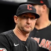 FILE - Cleveland Guardians bench coach Craig Albernaz looks on from the dugout before a baseball game against the Tampa Bay Rays, July 14, 2024, in St. Petersburg, Fla. (AP Photo/Phelan M. Ebenhack, File)