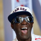 Flavor Flav laughs during an interview with The Associated Press at the USA house at the 2024 Summer Olympics, July 25, 2024, in Paris, France. (AP Photo/Luca Bruno, file)