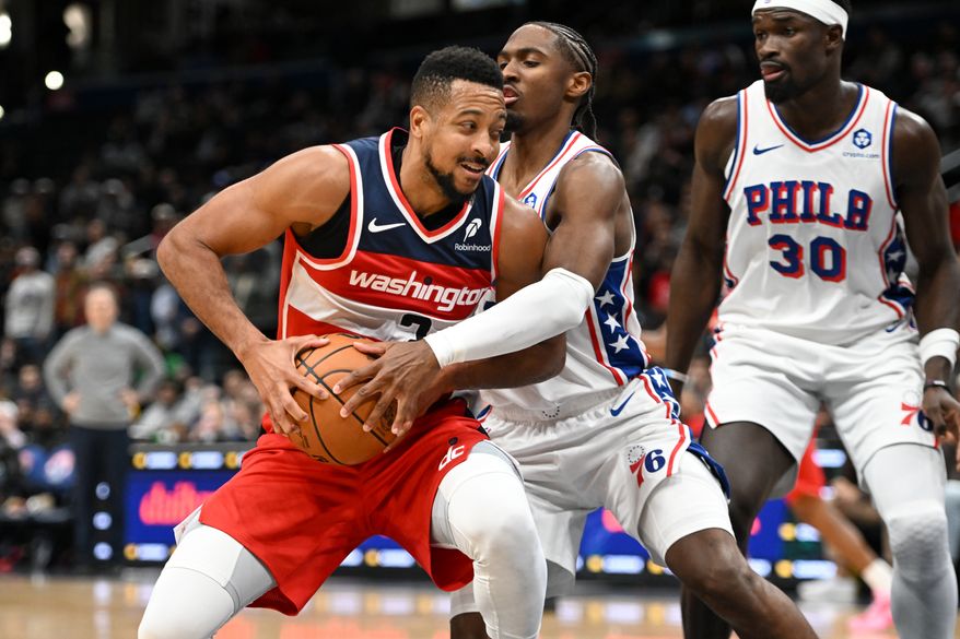 Washington Wizards guard CJ McCollum (3) trying to take the ball to the hoop while being defended by Philadelphia 76ers guard Tyrese Maxey (0) during the fourth quarter of an NBA game at Capital One Arena in Washington D.C., October 28, 2025. (Photo for the Washington Times)