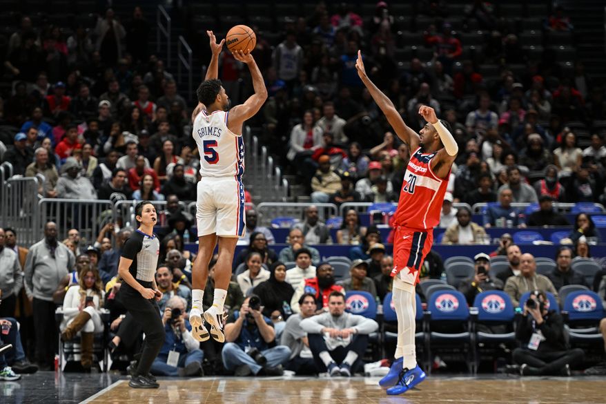 Philadelphia 76ers guard Quentin Grimes (5) hitting a three point shot to tie the game late in the fourth quarter of an NBA game against the Washington Wizards at Capital One Arena in Washington D.C., October 28, 2025. (Photo for the Washington Times)