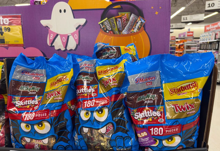 Halloween candy is displayed in a grocery store in Carmel, Ind., Oct. 20, 2025. (AP Photo/Michael Conroy, File)