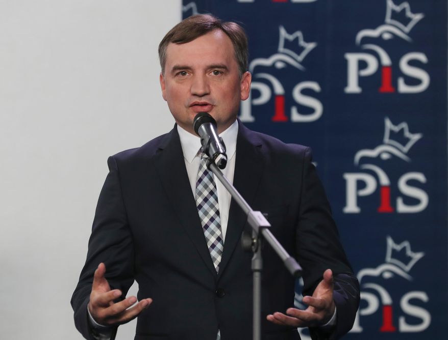 Former Justice Minister Zbigniew Ziobro speaks to reporters alongside in Warsaw, Poland, Sept. 26, 2020. (AP Photo/Czarek Sokolowski, file)