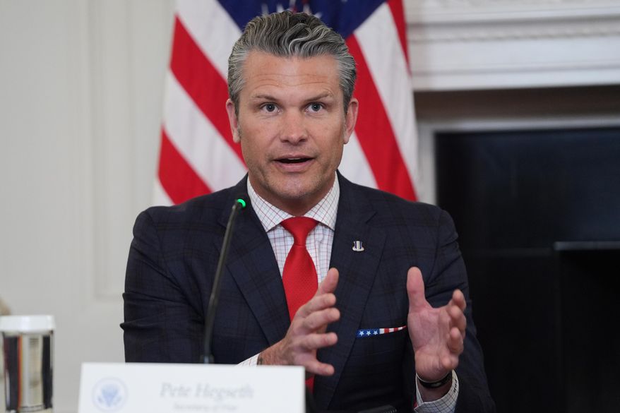 Defense Secretary Pete Hegseth answers a question from a reporter during a roundtable on criminal cartels in the State Dining Room of the White House, Thursday, Oct. 23, 2025, in Washington. (AP Photo/Evan Vucci) ** FILE **