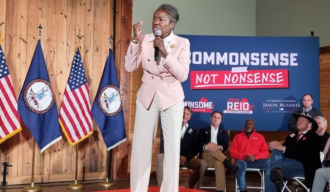 Virginia gubernatorial candidate Winsome Earle-Sears addresses a crowd during an Oct. 28 rally in Halifax County to tout her "common-sense" policies alongside Gov. Glenn Youngkin and Attorney General Jason Miyares as the campaign enters its final stretch. (Ben Sellers/The Washington Times)