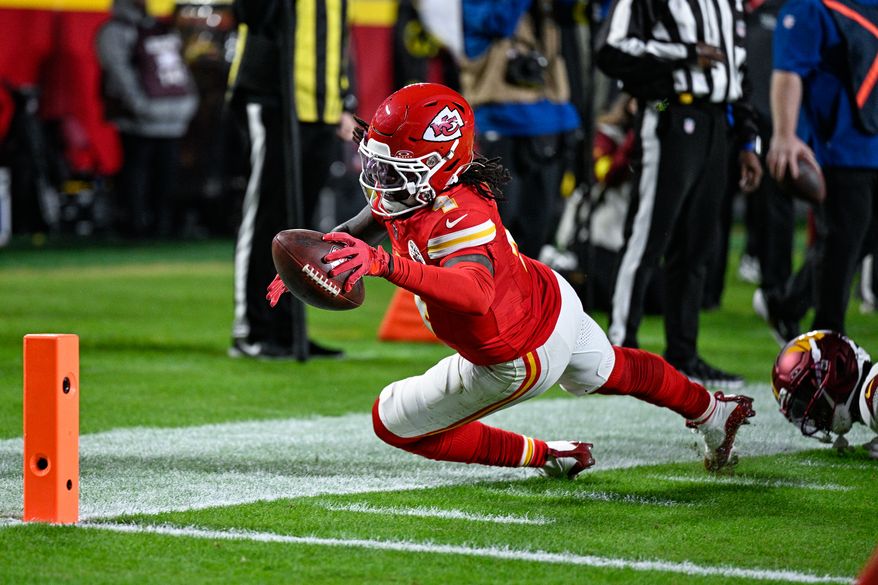Kansas City Chiefs receiver Rashee Rice (4) dives for the end zone against the Washington Commanders at GEHA Field at Arrowhead Stadium in Kansas City, Missouri, October 27, 2025. (Photo by Brian Murphy for the Washington Times)