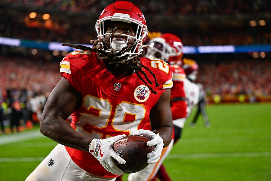Kansas City Chiefs running back Kareem Hunt (29) scores a touchdown on a 2-yard reception against the Washington Commanders at GEHA Field at Arrowhead Stadium in Kansas City, Missouri, October 27, 2025. (Photo by Brian Murphy for the Washington Times)