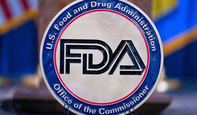 The Food and Drug Administration seal is seen at the Hubert Humphrey Building Auditorium in Washington, April 22, 2025. (AP Photo/Jose Luis Magana, File)