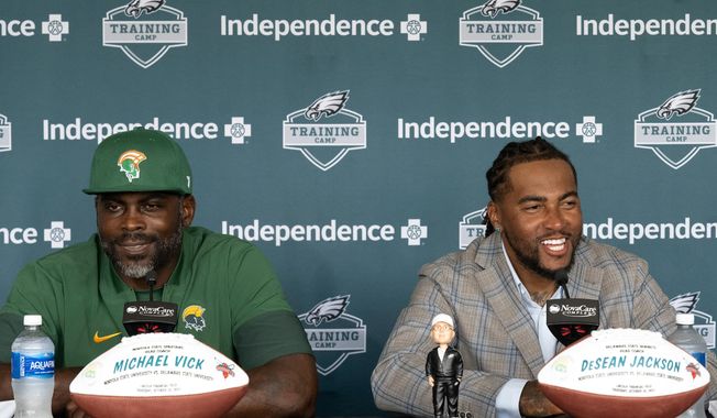 FILE - Former Philadelphia Eagles stars Michael Vick, left, and DeSean Jackson address the media at the Eagles' NFL football training camp Tuesday, Aug. 12, 2025, in Philadelphia. (Jose F. Moreno/The Philadelphia Inquirer via AP, file)