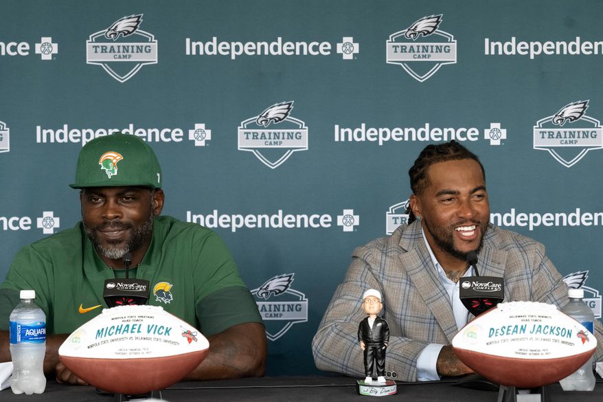 FILE - Former Philadelphia Eagles stars Michael Vick, left, and DeSean Jackson address the media at the Eagles' NFL football training camp Tuesday, Aug. 12, 2025, in Philadelphia. (Jose F. Moreno/The Philadelphia Inquirer via AP, file)