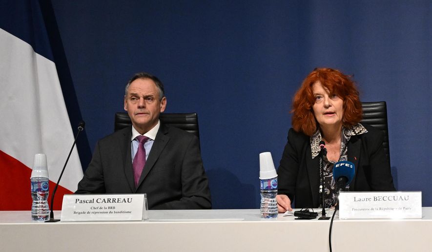 Head of the brigand of banditry repression Pascal Carreau, left, and Paris prosecutor Laure Beccuau speaks attend a news conference at the Paris courthouse Wednesday, Oct. 29, 2025, on the judicial investigation into the jewels robbery at the Louvre museum in Paris, France. (AP Photo/Emma Da Silva)