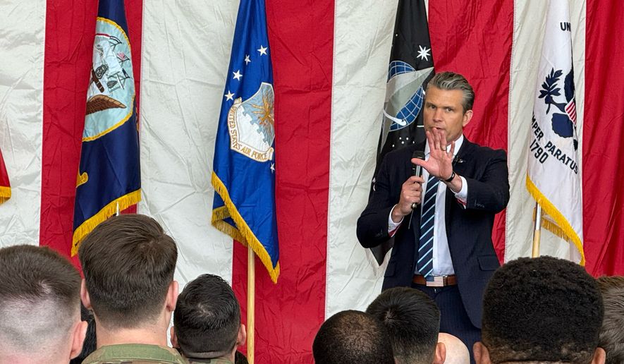 Defense Secretary Pete Hegseth speaks to U.S. troops during a joint press conference with Japanese Defense Minister Shinjiro Koizumi in Tokyo on Oct. 29, 2025. (Bill Gertz/The Washington Times)