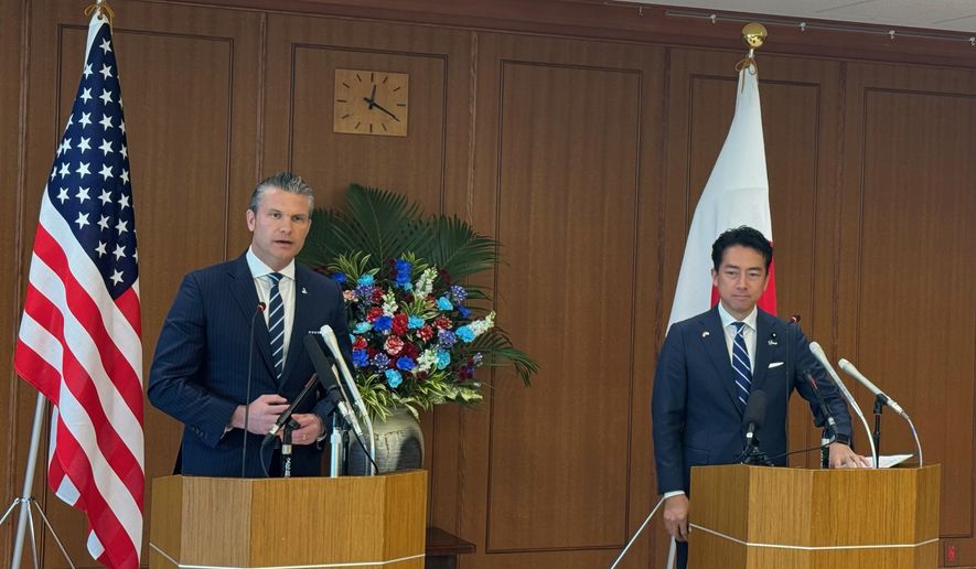 U.S. Defense Secretary Pete Hegseth (left) speaks during a joint press conference with Japanese Defense Minister Shinjiro Koizumi in Tokyo on Oct. 29, 2025. (Bill Gertz/The Washington Times)