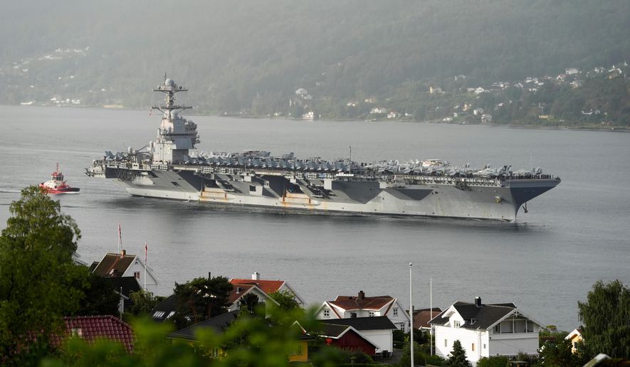 FILE - The American aircraft carrier USS Gerald R. Ford, on its way into the Oslofjord, at Drobak in Norway, Sept. 12, 2025. (Lise Aaserud/NTB Scanpix via AP, File)