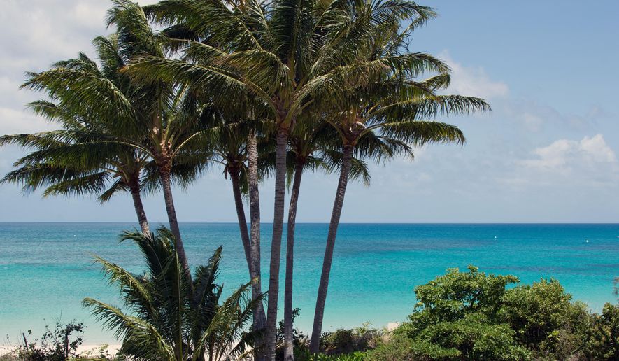 The view from a beachfront suite at the luxury resort Lizard Island, Queensland, Nov. 18, 2017. (Sarah Motherwell/AAP Image via AP) ** FILE **