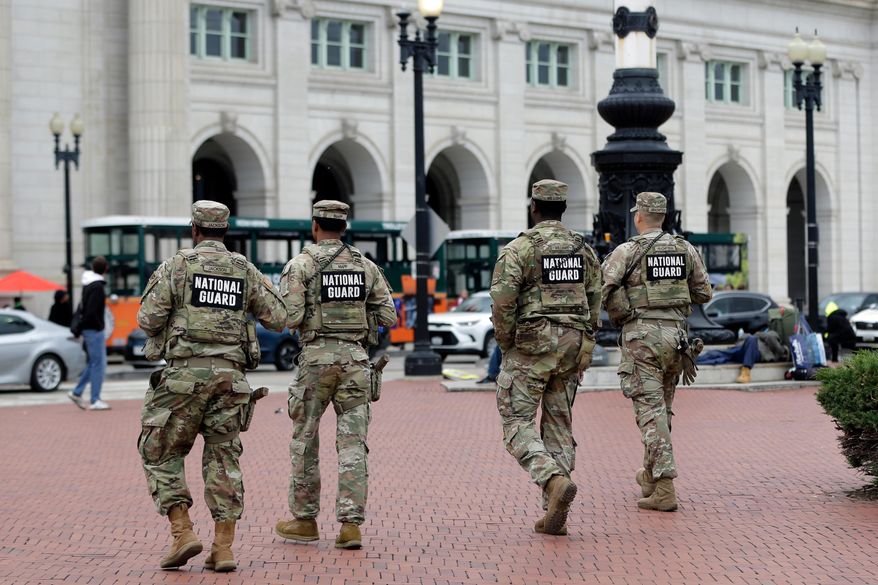National Guard soldiers patrol at Union Station, Tuesday, Oct. 28, 2025, in Washington. A soldier (not pictured) from the Alabama National Guard sent to the District as part of Joint Task Force-D.C. died in a non-duty-related incident in the city earlier this month, officials said. (AP Photo/Rahmat Gul)