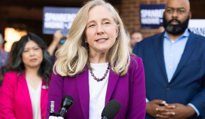 FILE - Democratic gubernatorial candidate Abigail Spanberger speaks to members of the press on the first day of early voting in Henrico County, Sept. 19, 2025. (Mike Kropf /Richmond Times-Dispatch via AP, File)