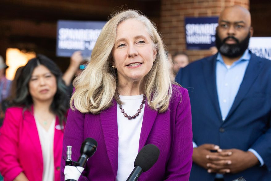 FILE - Democratic gubernatorial candidate Abigail Spanberger speaks to members of the press on the first day of early voting in Henrico County, Sept. 19, 2025. (Mike Kropf /Richmond Times-Dispatch via AP, File)