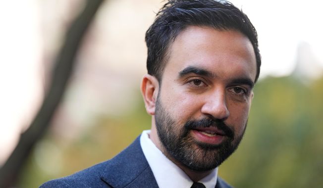 New York City mayoral candidate Zohran Mamdani talks to reporters in New York, Monday, Oct. 27, 2025. (AP Photo/Seth Wenig)