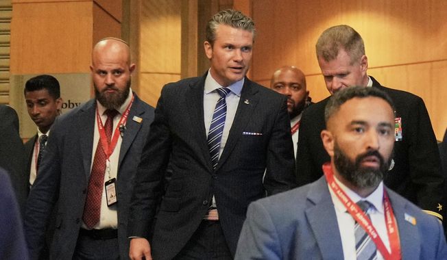 U.S. Defense Secretary Pete Hegseth leaves after a bilateral meeting with Malaysia's Defense Minister Mohamed Khaled Nordin ahead of the Association of Southeast Asian Nations (ASEAN) Defense Ministers' Meeting in Kuala Lumpur, Malaysia, Thursday, Oct. 30, 2025. (AP Photo/Dita Alangkara)